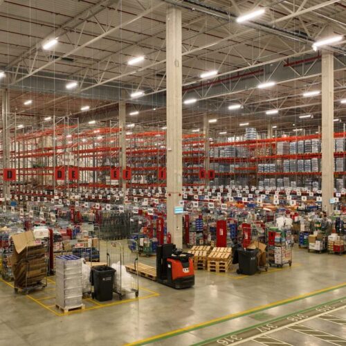 Fornax LED high-bay luminaires lighting a Rimi food distribution warehouse